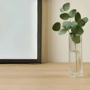 Elegant glassware display with vase, goblet, and pitcher – HONORLIVING blog banner “From Concept to Creation