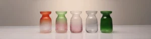 Set of modern gradient glass vases in pink, green, and clear tones showcasing 2025 OEM/ODM glassware design trends and sustainable craftsmanship.