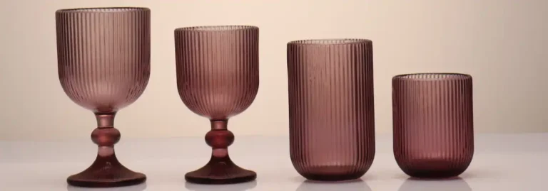 Elegant pink glass drinkware set of four with modern minimalist design